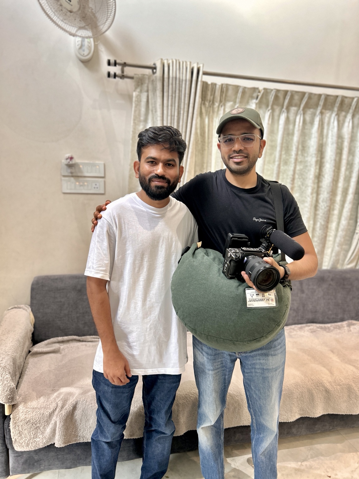 Prakhar Deep Jain with a contributor after filming